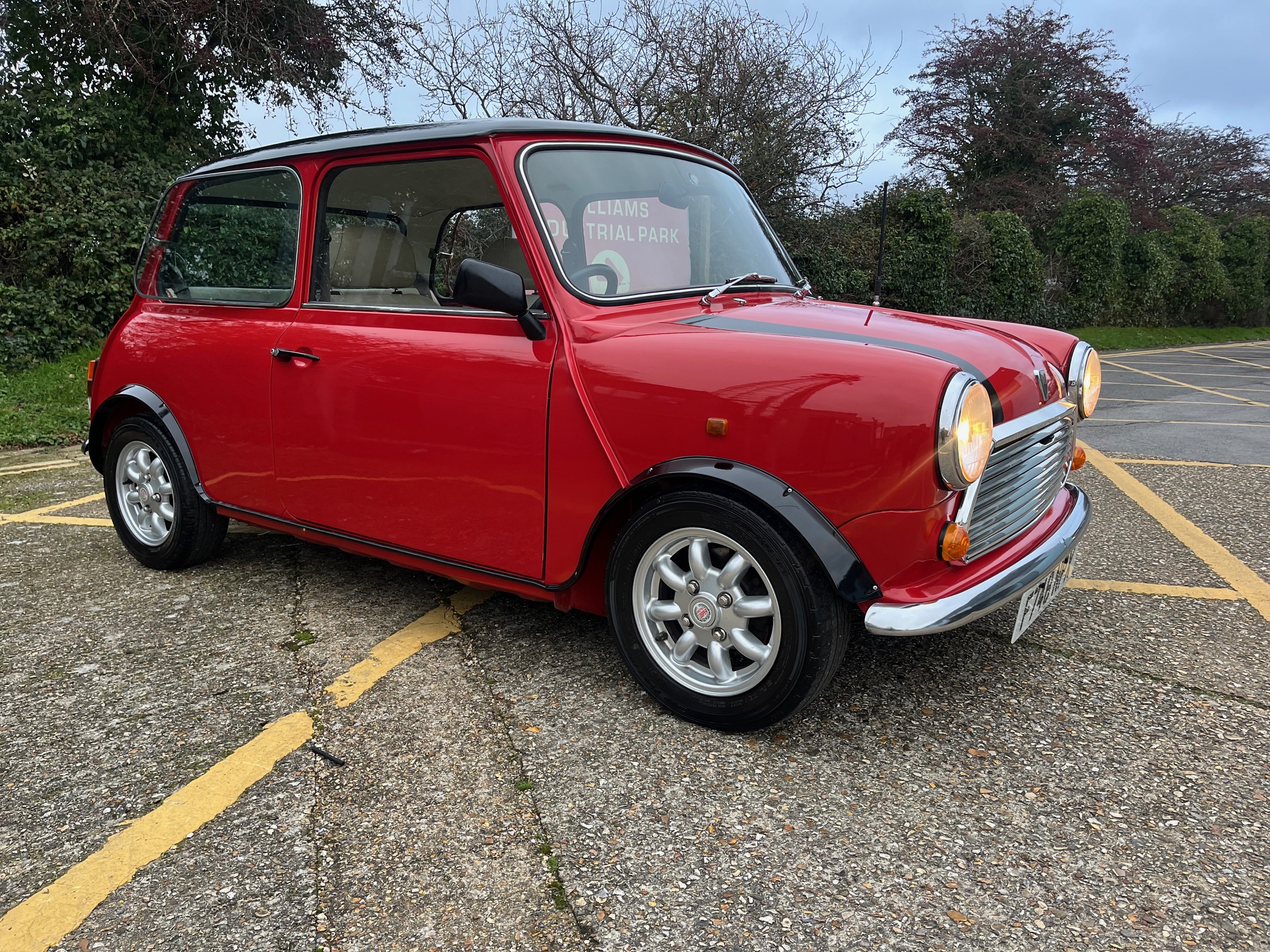 1989 Austin Mini Mayfair. 1275cc. Flame Red. Black Roof. Cream interior. Cooper looks. Great fun. Ready to go.